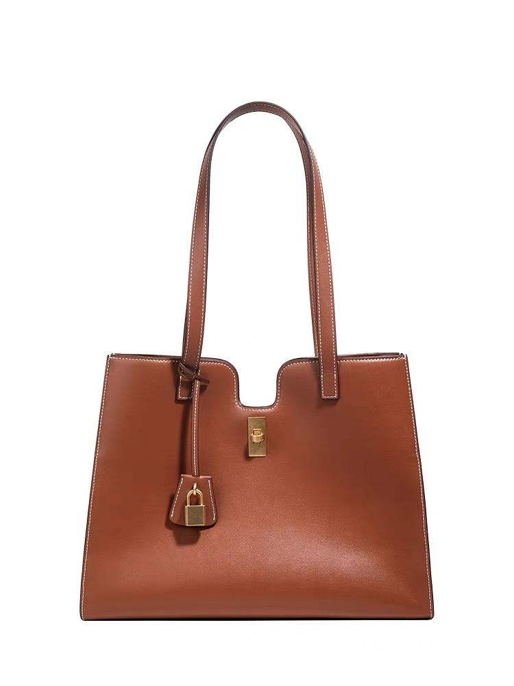 Elegant Leather Handbag with Gold Lock Detail